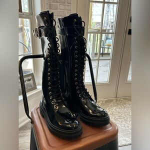 Women NWOB "GB" black patten leather tall lace up boots.6.5 M.